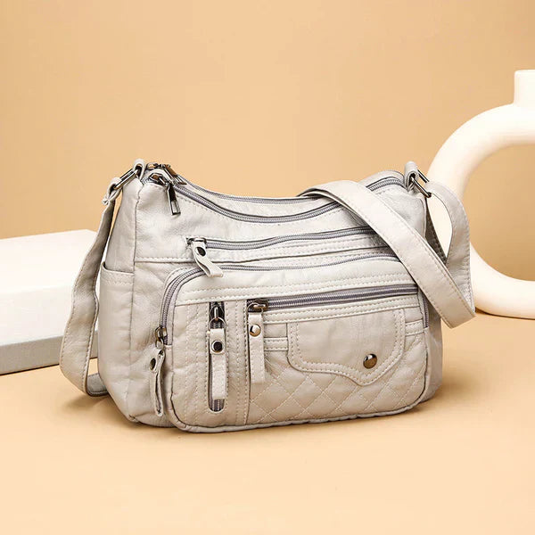 Bandolera Cuero Suave Esencia Cumbre Prisma, Elegancia y Funcionalidad en Cada Detalle